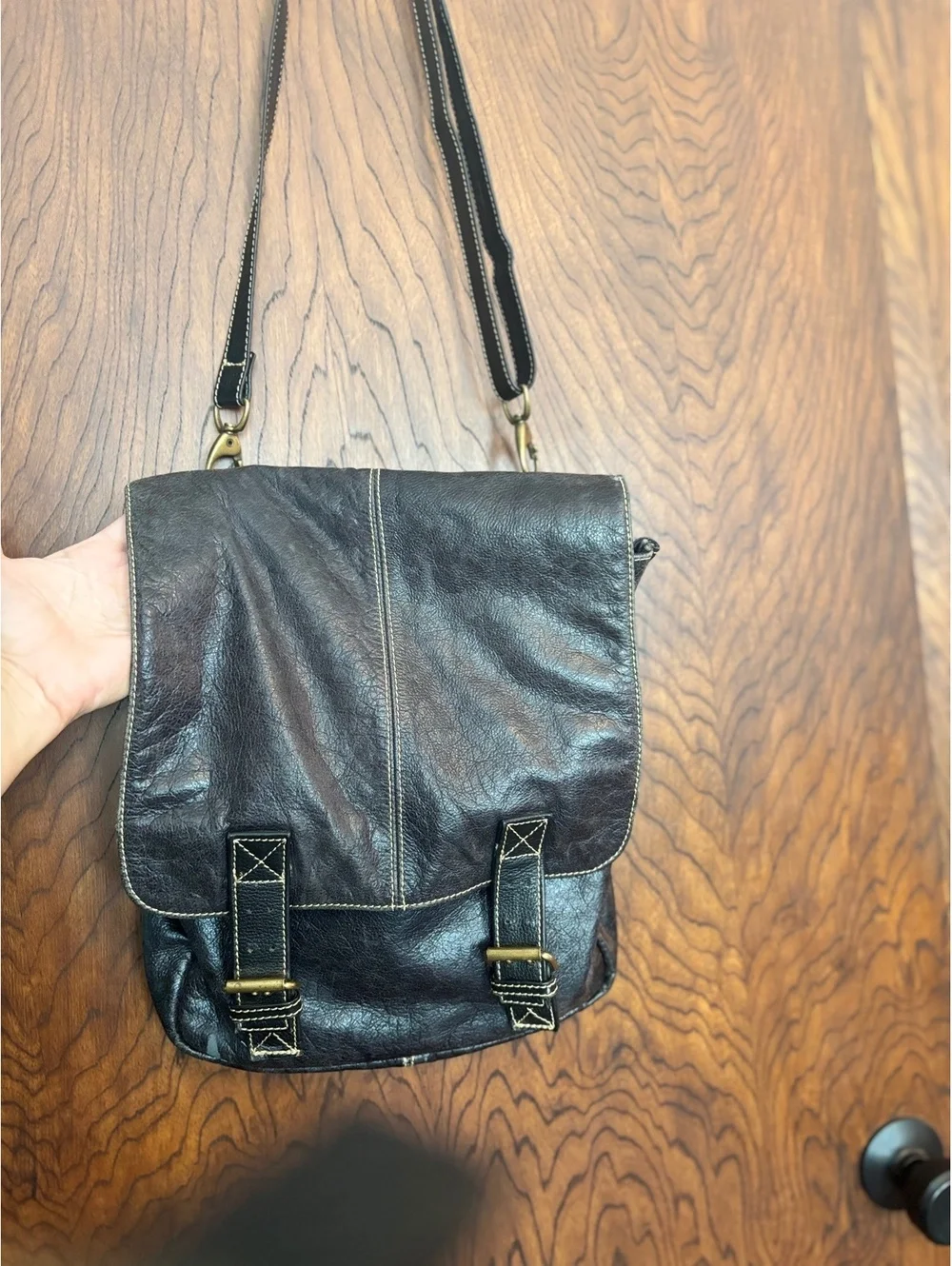 Black Leather Crossbody Backpack with Buckle Closure